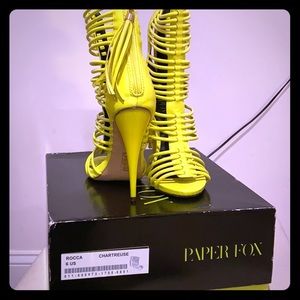 Neon yellow strappy heels